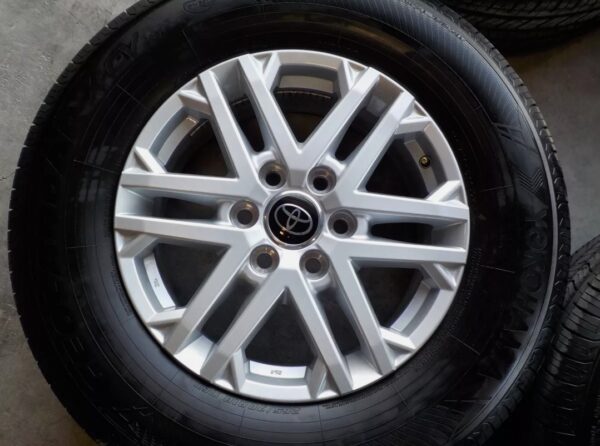 2021 Toyota Tundra 18x7.5" factory wheels 6x5.5 with 265/70R18 Bridgestone tires - Image 2